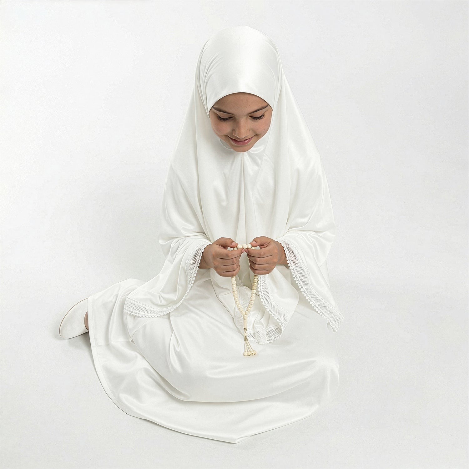 Kids white satin khimar with lace-trimmed sleeves and long prayer-bead tassel