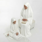 Kids and adult white satin khimar sets with lace trim and draped prayer-bead chain