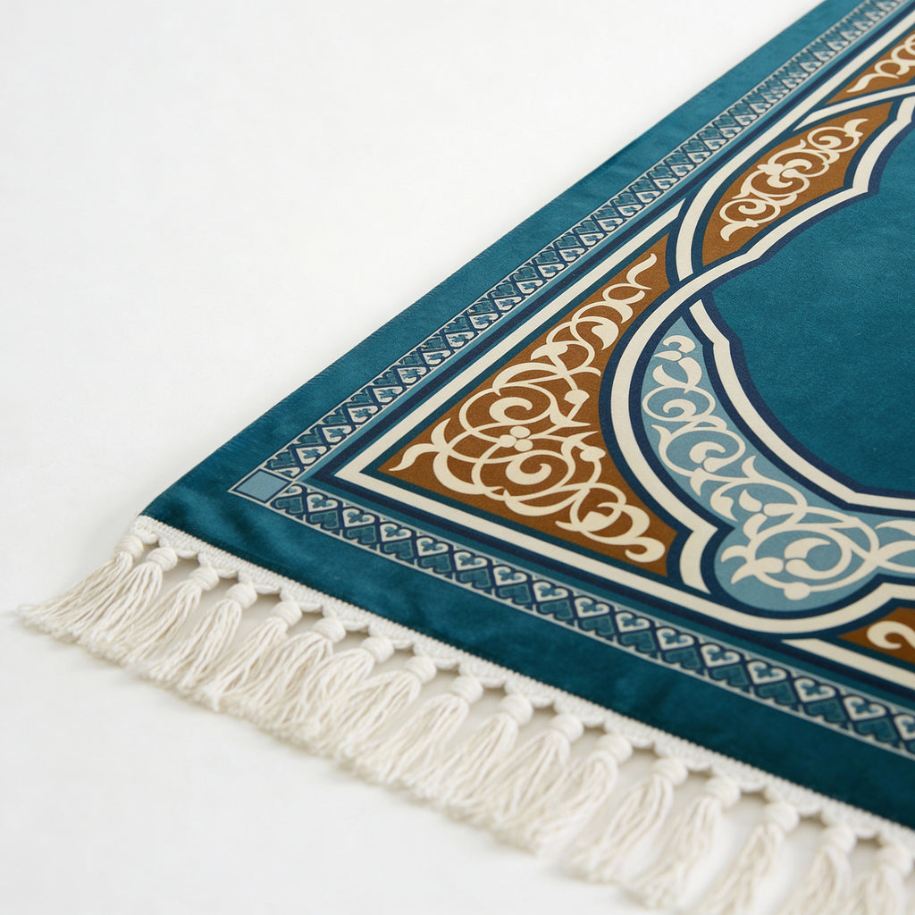 Blue prayer mat with navy and tan geometric trim and white fringed border