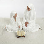 Kids and adult white satin khimar sets with lace-edged hems and prayer-bead chain