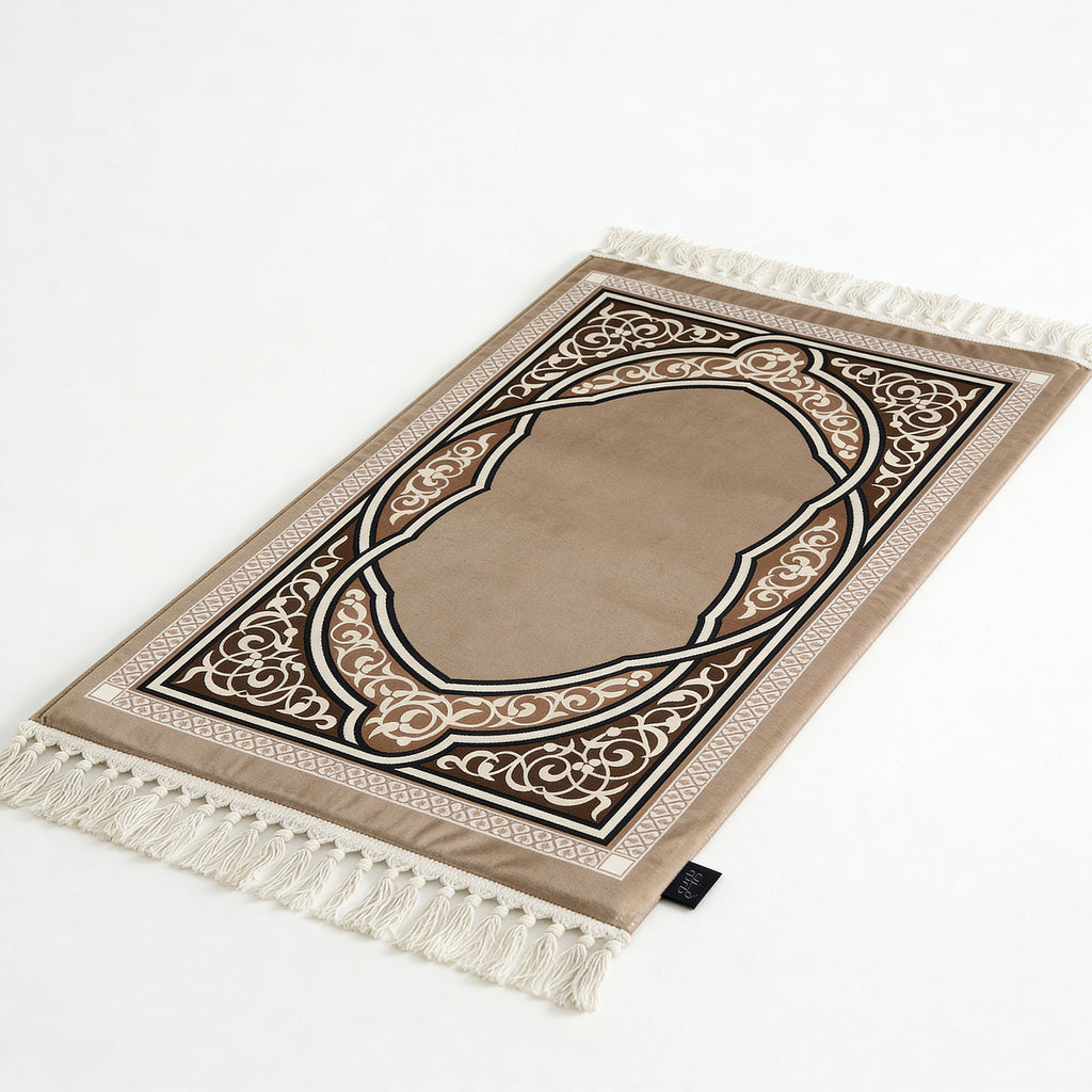 Padded prayer mat in beige with brown arch pattern and white tassel fringe