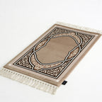 Padded prayer mat in beige with brown arch pattern and white tassel fringe