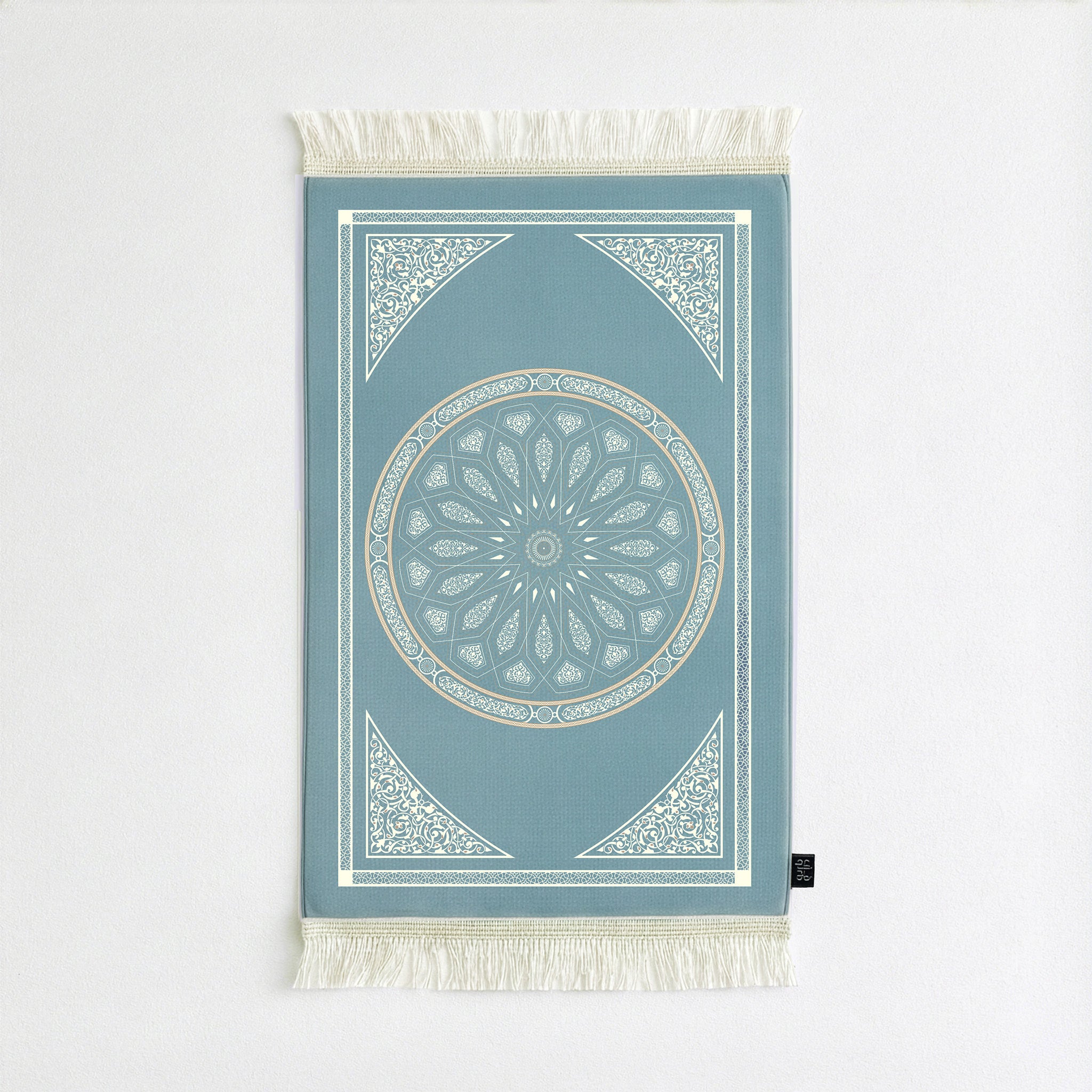 Velvet prayer mat with blue field and gold crescent and medallion design, fringed edges