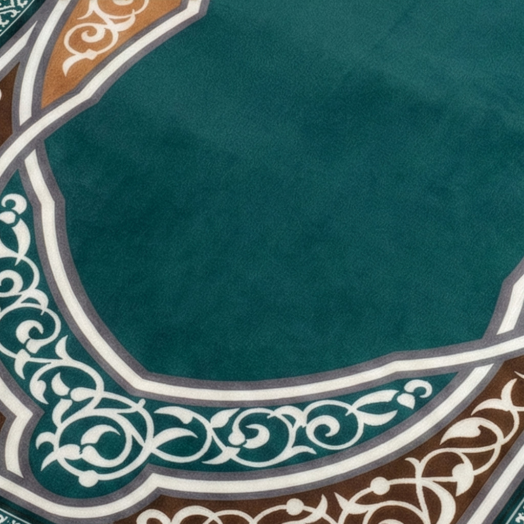 Padded prayer mat close-up of teal surface with ornate border edging
