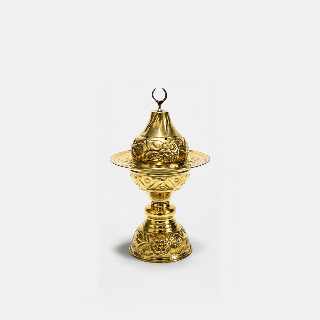 Copper incense burner with ornate lid and decorative base
