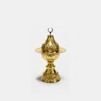 Copper incense burner with ornate lid and decorative base