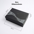 Black gift box with calligraphy lid shown with size measurements in cm