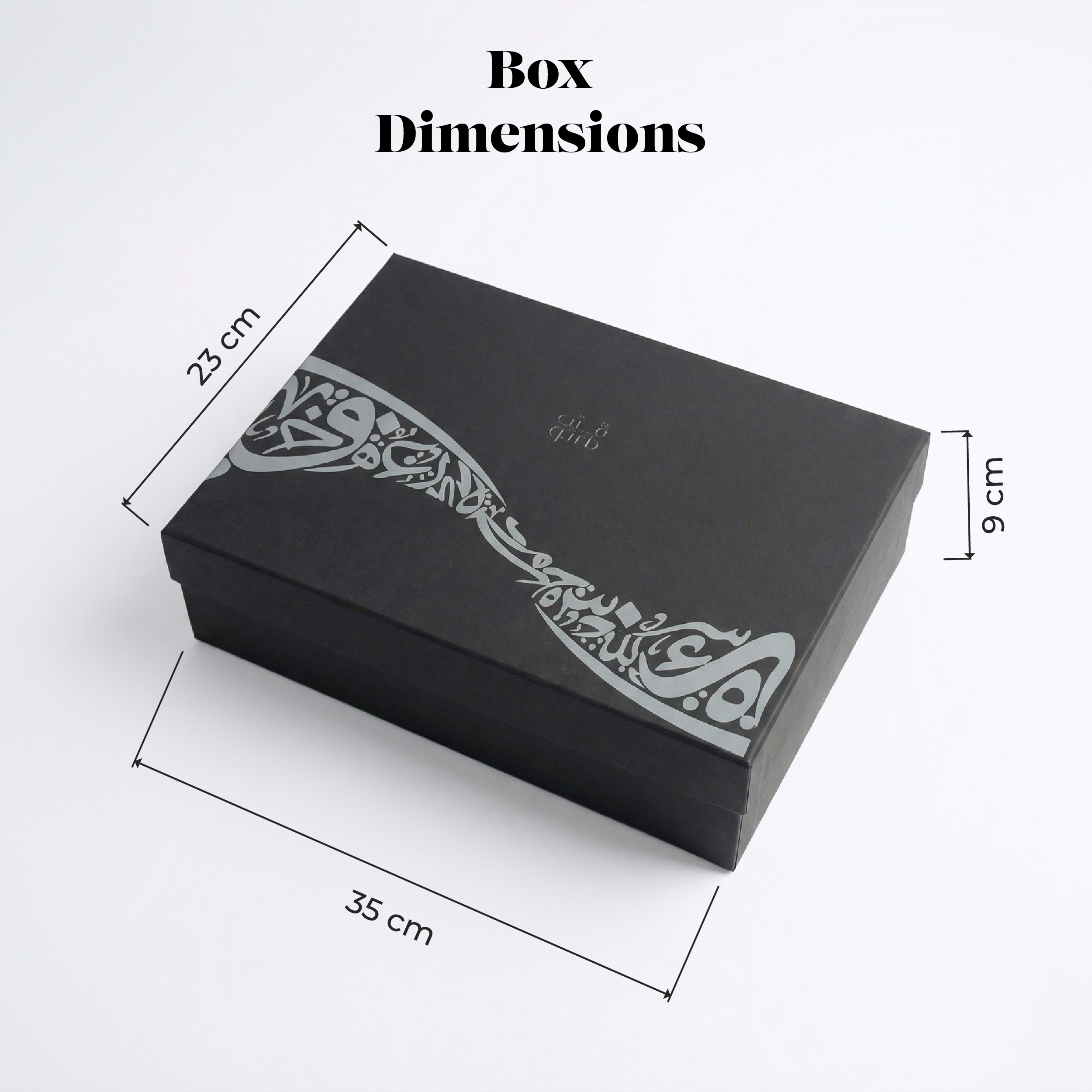 Black gift box with calligraphy lid shown with size measurements in cm